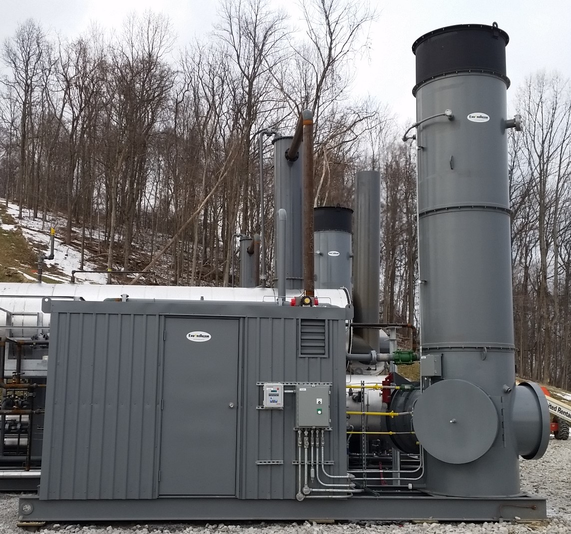 Enclosed combustor package with control enclosure and stack installed on a skid